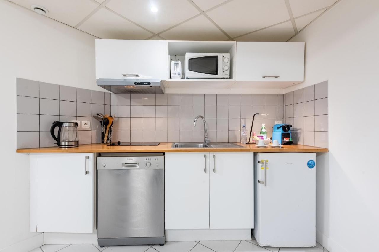 Appartement Triplex Magenta Quest à Paris Extérieur photo